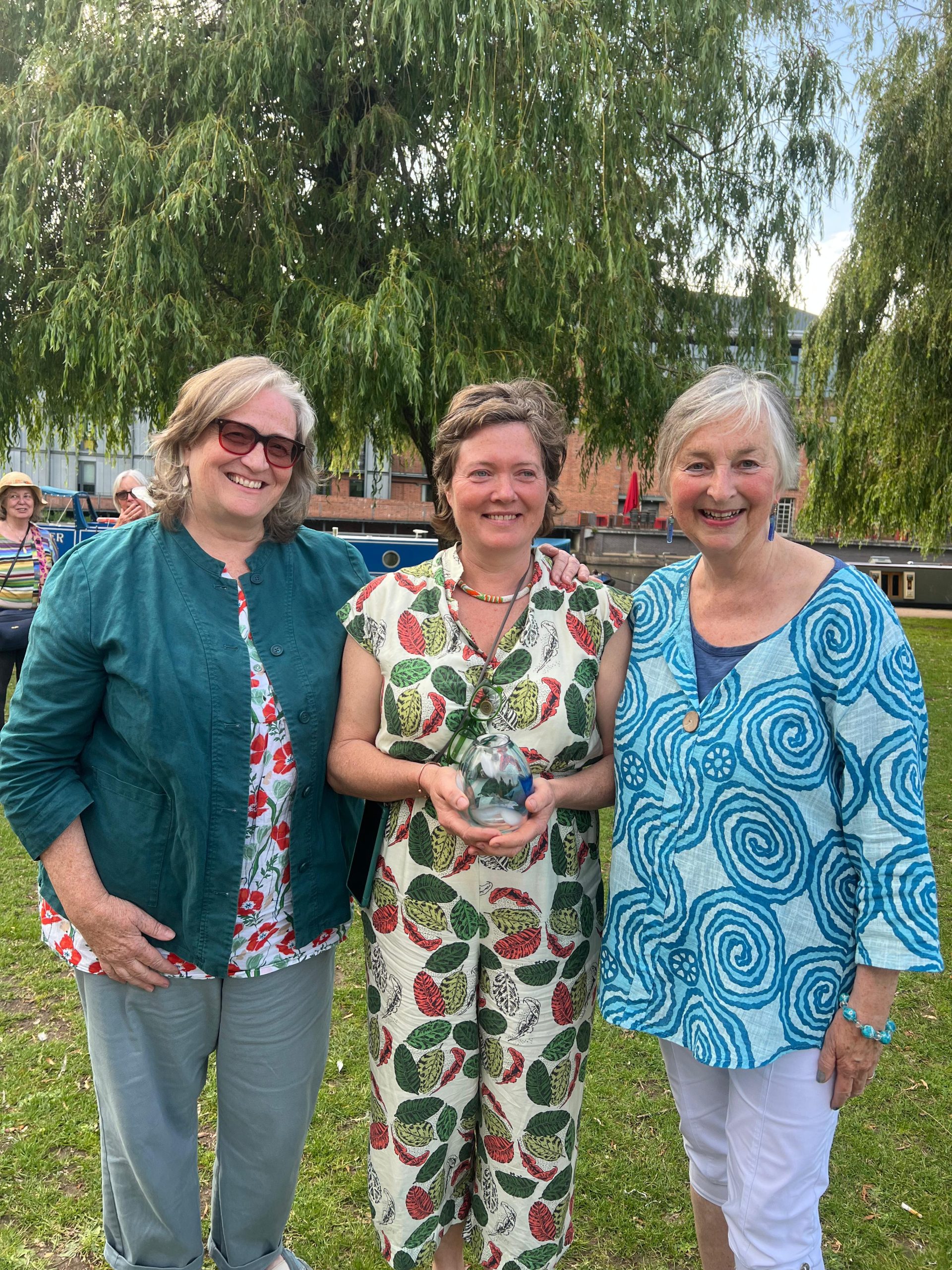 Presentation of the vase to Councillor Olivia Hatch with Mary Manandhar (River Hope) and Virginia Wollaston (MSD)